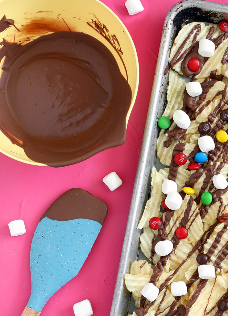 melted chocolate on potato chips snack mix