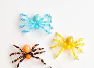 Step-by-Step Beaded Spider Tutorial for Halloween Colourful group of beaded spiders on a white background