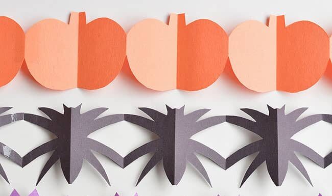 How to make Halloween Paper Garland Cutouts These Halloween paper garland cutouts are SO CUTE and surprisingly simple to make! This is such a fun Halloween craft for kids! Even teens, tweens, adults and seniors would have fun making them! They'd look great hung up on a door, on the walls, or even in the window! What a simple paper craft for kids and a great way to make some non-spooky DIY Halloween decor!