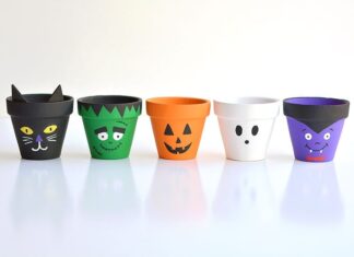 DIY Halloween Clay Pots: Fun and Spooky Crafts Halloween clay pots painted like a black cat, Frankenstein, jack-o-lantern, ghost, and vampire