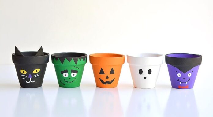 DIY Halloween Clay Pots: Fun and Spooky Crafts Halloween clay pots painted like a black cat, Frankenstein, jack-o-lantern, ghost, and vampire