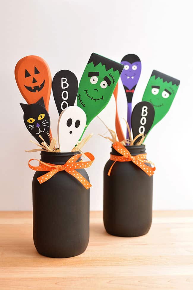 Halloween wooden spoon crafts in painted mason jars