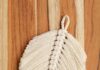 How to Make a Macrame Feather Macrame feather on a wooden background