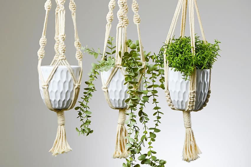 3 different macrame hanging planters made with different knot patterns