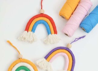 How to make Macrame Rainbow Group of colourful macrame rainbows on a white background