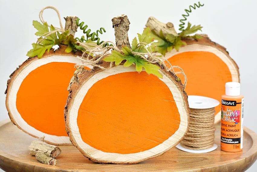 Group of painted wood slice pumpkins