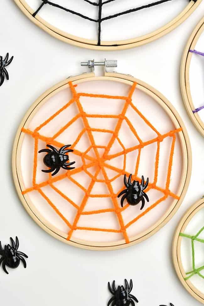 DIY spider web made from pumpkin orange yarn