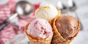 strawberry, vanilla, chocolate ice cream with waffle cone on marble stone backgrounds