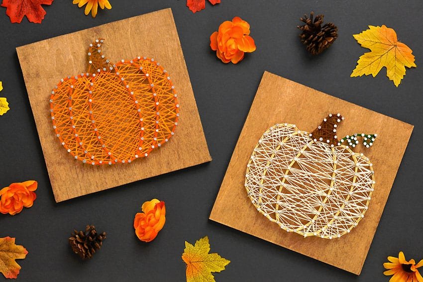 Pretty fall string art designed to look like a pumpkin