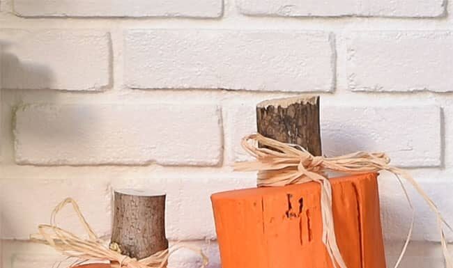 DIY Tree Stump Pumpkins: Simple Fall Decoration Stump pumpkins grouped together