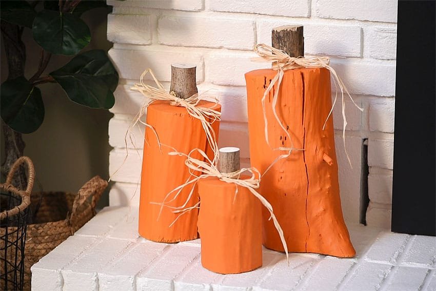 Grouping of wood stump pumpkins