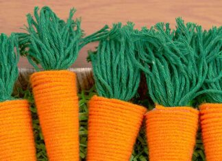 How to Make Yarn Carrots Yarn wrapped carrots in a basket with Easter grass