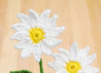 How to Crochet a Daisy: Easy Flower Pattern Easy crochet daisy made with a free, printable pattern