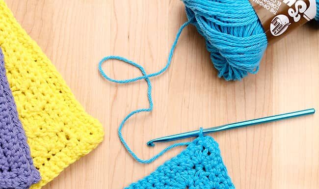 How to Crochet a Dishcloth: Easy Pattern Tutorial Blue crochet dishcloth made with a free printable pattern