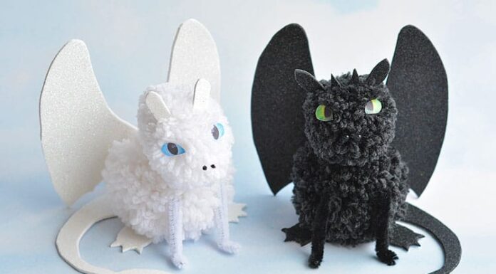 Pom Pom Dragons Inspired by How to Train Your Dragon These pom pom dragons, inspired by How to Train Your Dragon: The Hidden World (in theaters February 22) are so fun! You can easily make Toothless and Light Fury at home with a few simple materials. They're super cute, simple to make and the kids loved playing with them! It's so easy to make pom poms just by wrapping yarn around your fingers! #HowToTrainYourDragon