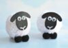 How to Make Pom Pom Sheep Two pom pom sheep beside each other