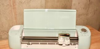Cricut Explore Air 2 Review: The Ultimate Cutting Machine for DIY Projects Cricut Explore Air 2 cutting machine in use with vinyl and a dual tool holder visible