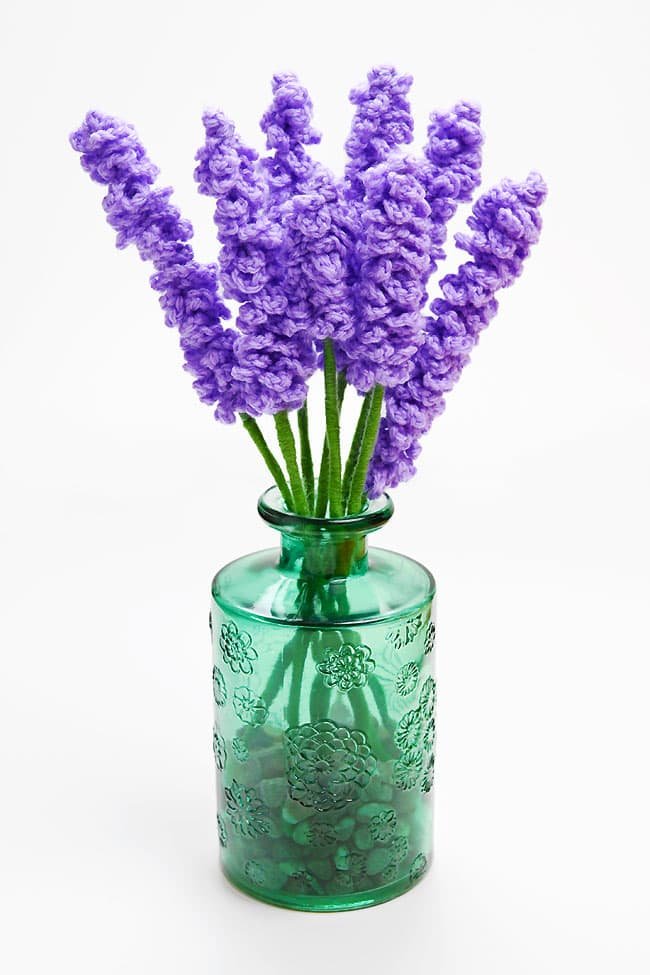 Lavender crochet flowers in a vase