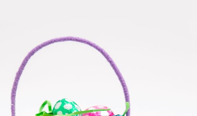DIY Mini Easter Basket Craft: Simple Tutorial Small purple Easter basket filled with chocolate eggs