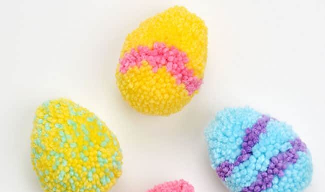DIY Pom Pom Easter Eggs: Fun Holiday Craft Colourful yarn pom pom Easter eggs