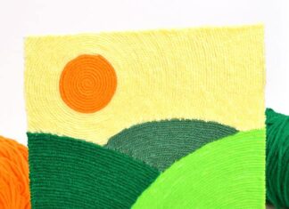 DIY Yarn Art: Creative and Fun Craft Ideas Yarn art displayed on a small easel stand