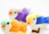 How to Make a Yarn Bird Group of DIY yarn birds on a white background