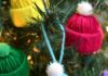 How to Make Yarn Hat Ornaments Colourful yarn hat ornaments on a Christmas tree