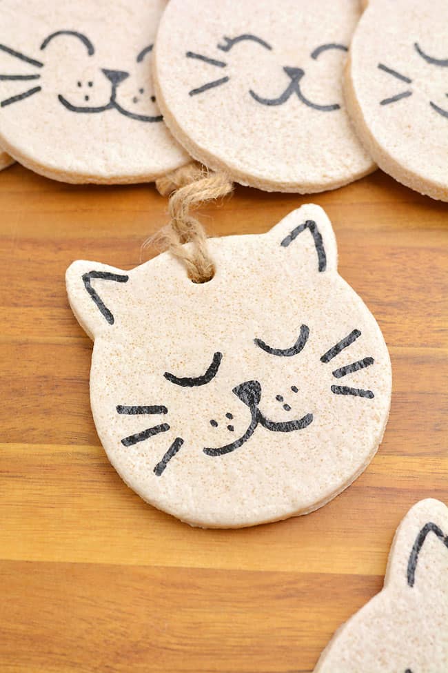 Group of cat ornaments ready to be hung on the Christmas tree