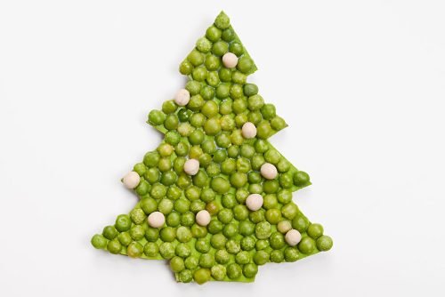 Tree shape made of green peas and white lentils