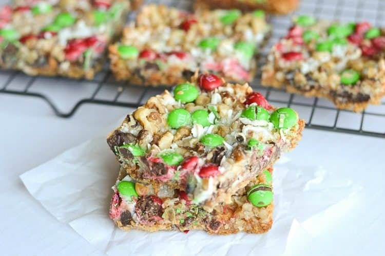 These Christmas magic cookie bars are a perfect treat to serve at a holiday party, just cut into bite size pieces and serve for a delicious holiday treat!