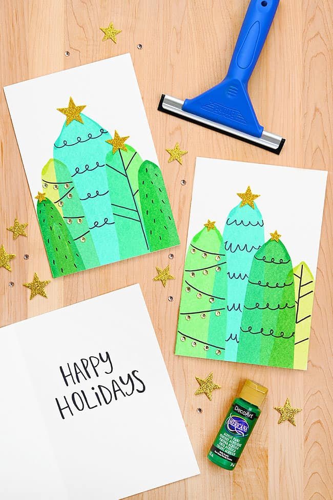 Christmas trees on DIY cards painted with a squeegee