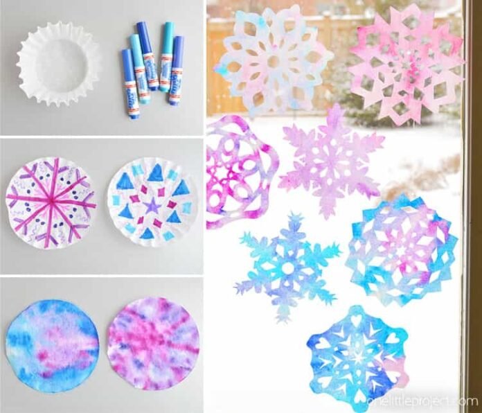 These coffee filter snowflakes are so easy to make and they are SO PRETTY! This is such a fun winter craft idea! A great activity for a snow day at home but also simple enough for teachers to make with the whole class at school. They make beautiful sun catchers and are a great Christmas decoration that can stay up all winter long! 