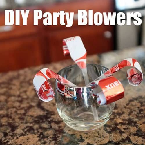 19 Christmas Wrapping Paper Crafts - DIY Party Blowers