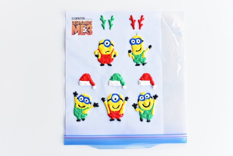 These Holiday Minion Window Clings were inspired by #DespicableMe3 now available on Blu-ray and DVD! They are so easy to make and they look so cute! What a fun way to add some holiday cheer to your windows!! #DM3Family #sponsored