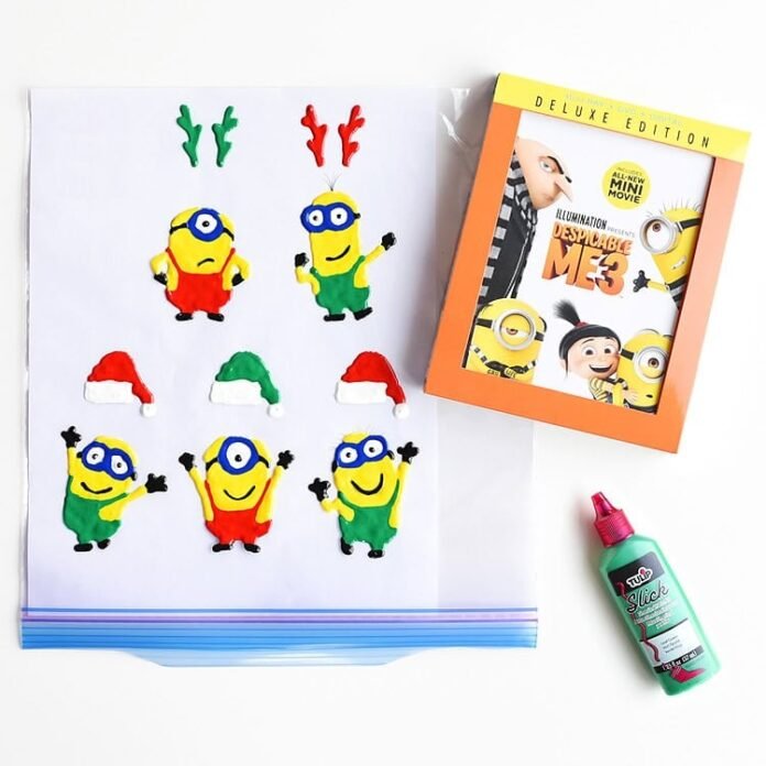 These Holiday Minion Window Clings were inspired by Despicable Me 3 (now available on Blu-ray and DVD!). They are SO EASY to make and they look so cute! What a fun way to add some festive cheer to your windows!!