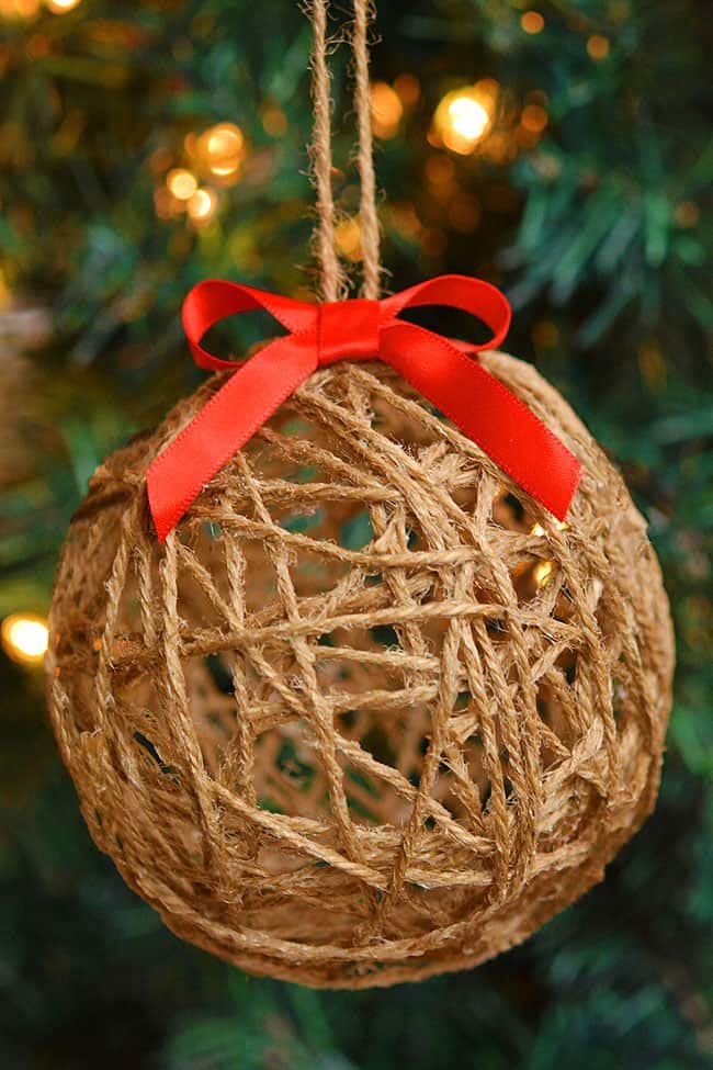 DIY twine ball ornaments are so FUN to make and add such rustic charm to your tree! What a fun homemade Christmas craft the whole family can enjoy together!