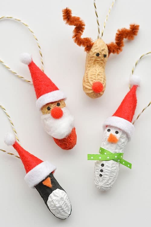 These peanut Christmas ornaments are SO ADORABLE and they're really easy to make! They're such a fun and simple Christmas craft to make with the kids!