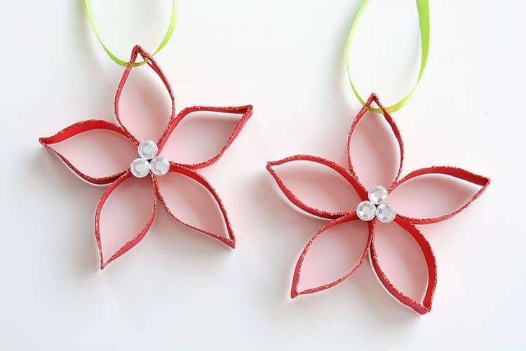 2 poinsettia ornaments made from paper rolls