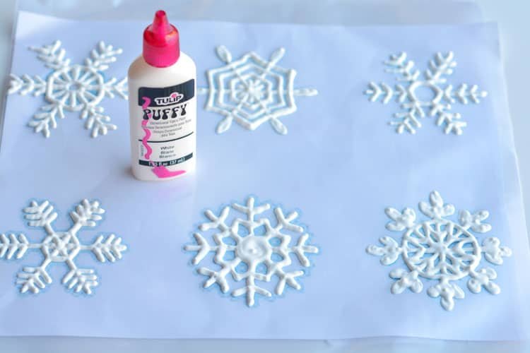 These snowflake window clings are so easy to make and they end up looking SO PRETTY! They're a great decoration that can be left up all winter!