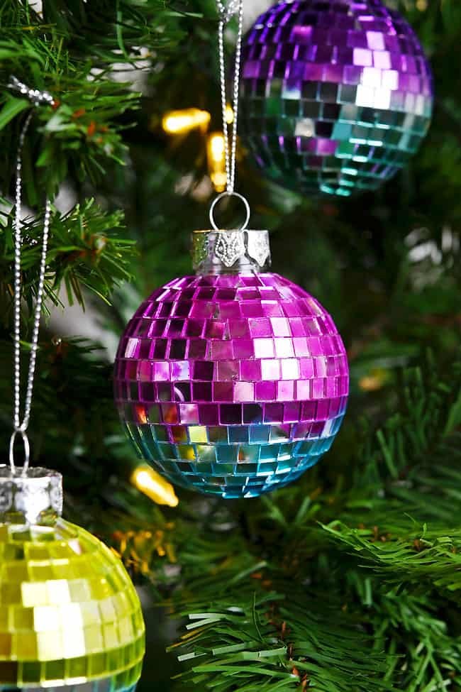 Mirror ball ornaments hanging on a tree