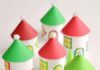 DIY Twinkling Paper Roll Christmas Village: A Festive Craft Idea This paper roll Christmas village is SO CUTE and it's really easy to make! Add a few battery operated tea lights and you can create a magical glowing village. This is such a cute Christmas decoration and a super fun Christmas craft to make with the kids.