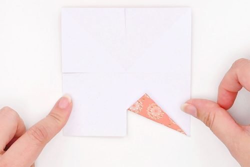 Square paper folded in at a slit in one side