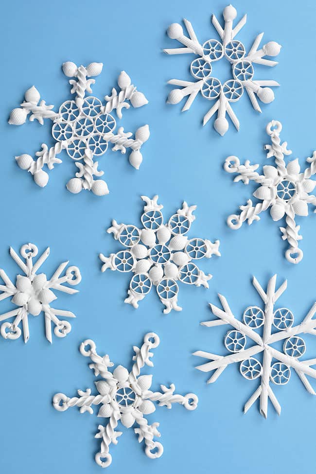 Pasta snowflakes on a blue background