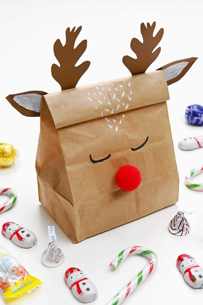 DIY gift bag decorated like Rudolph the Red Nosed Reindeer