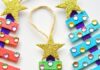 Glittering Popsicle Stick Christmas Trees These popsicle stick Christmas trees are SO EASY to make and they're so beautiful! The kids loved decorating them! Such an awesome dollar store Christmas craft idea!!