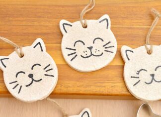 How to make Salt Dough Cat Ornaments Painted salt dough cat ornaments on a wooden surface