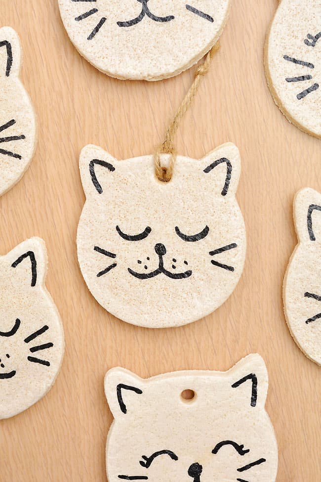 Closeup of a happy cat face on a salt dough ornament