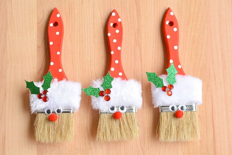 Santa Claus Paint Brushes Three paint brushes decorated as Santa Claus