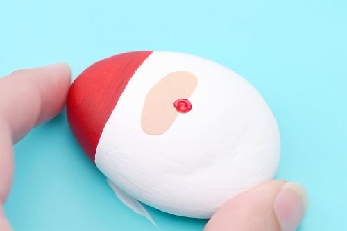 santa-claus-painted-rocks-4-500x333-1 Red, white, and peach painted rock