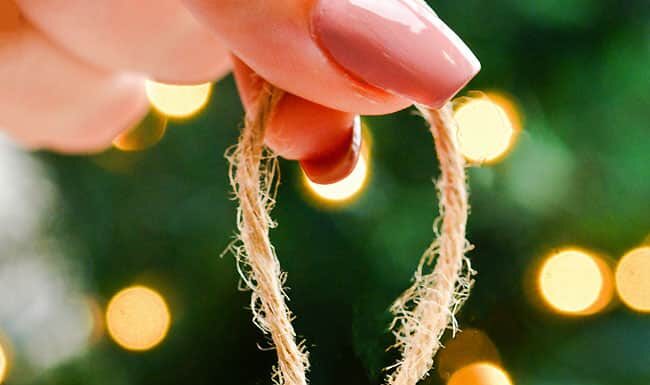 DIY Seashell Santa Ornaments DIY seashell Santa ornament in front of the Christmas tree
